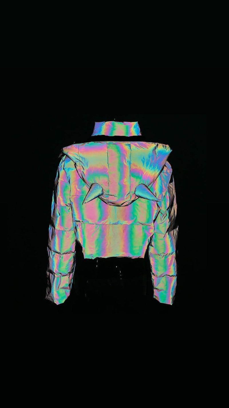 back view of our puffy reflective hooded devil jacket with two front pockets. The hood is detachable