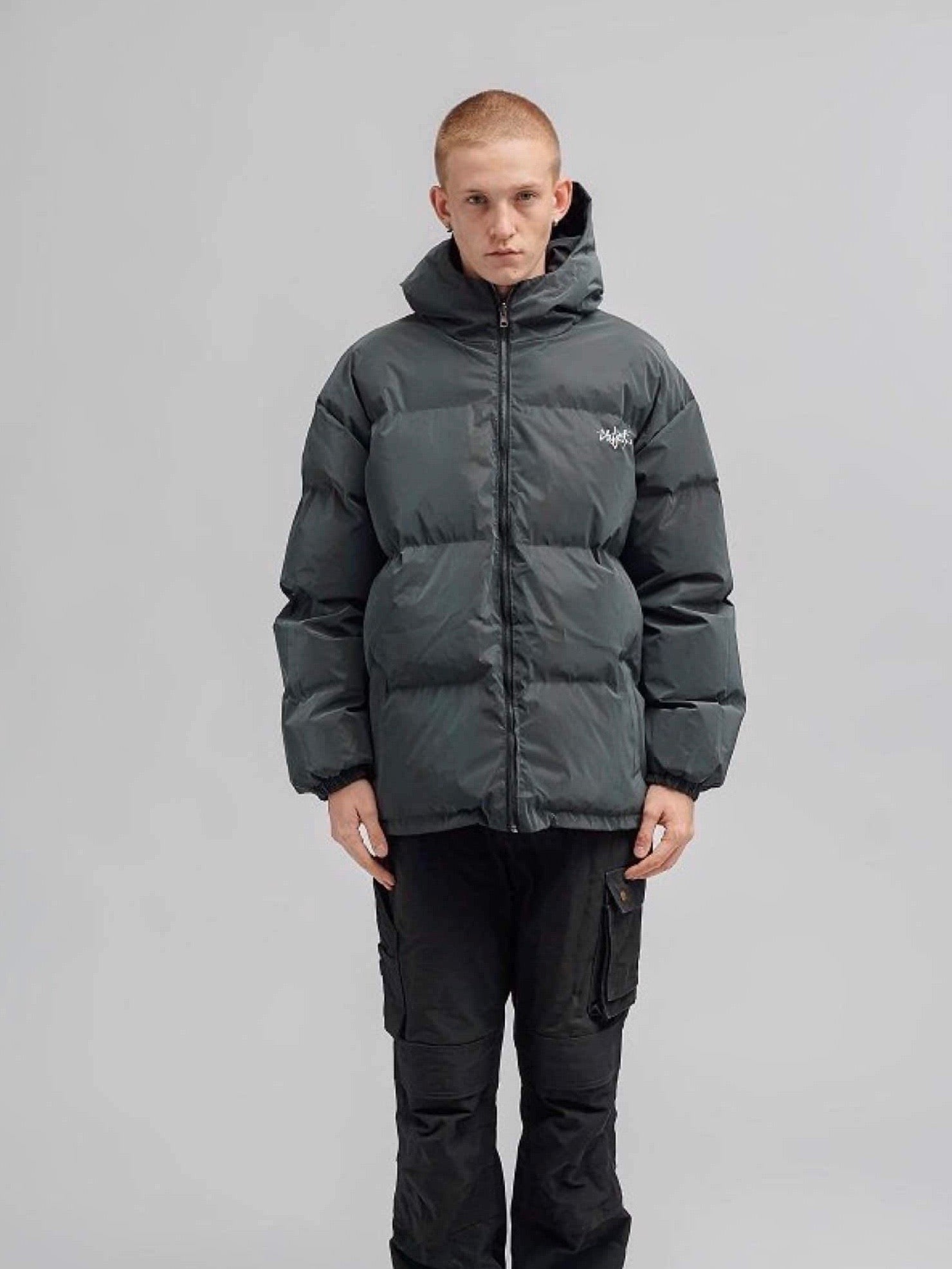 puffy long reflective jacket with a hood and two front pockets without light on it