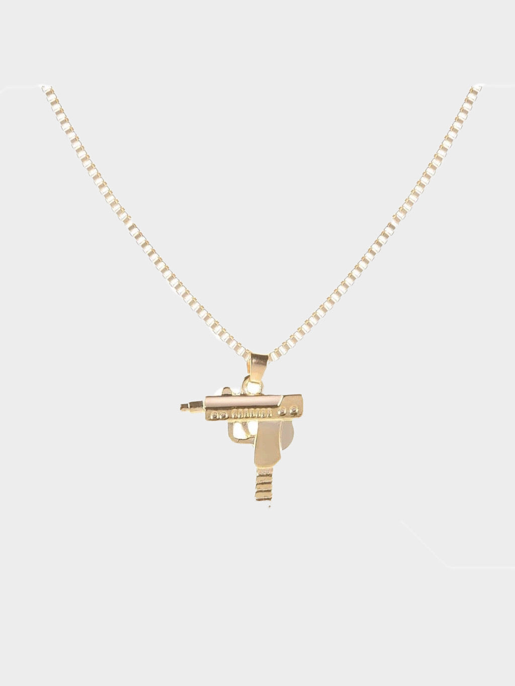 gold uzi pendant necklace