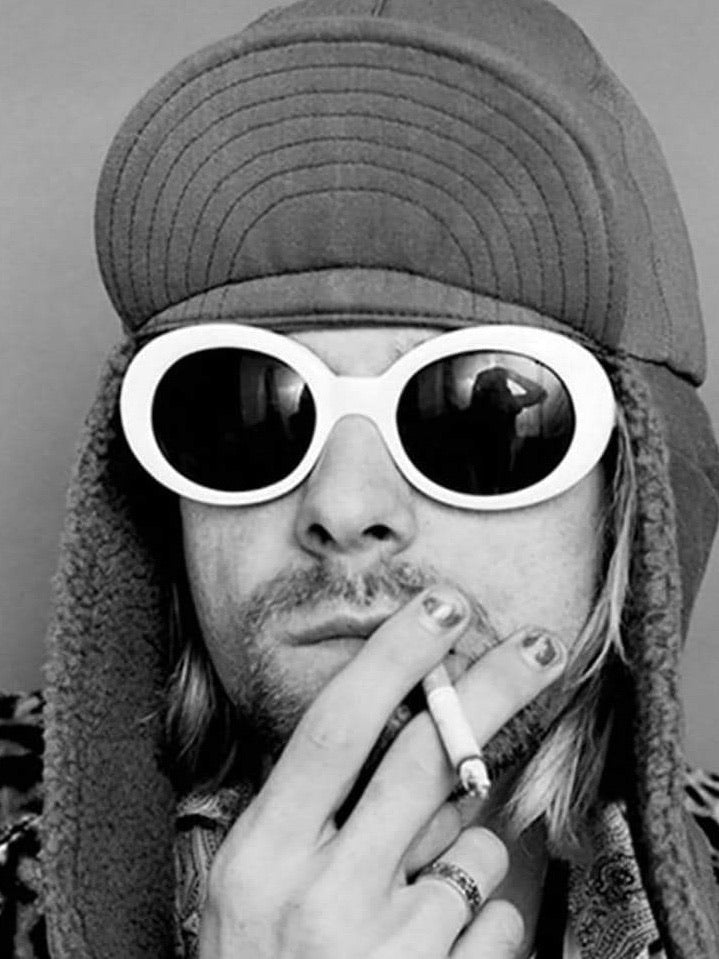 white frame and black glass sunglasses worn by a kurt cobain