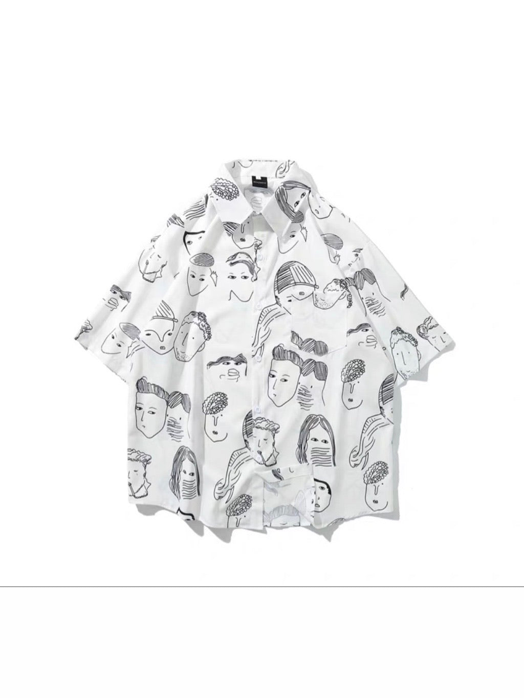 white shirt with black sketches faces