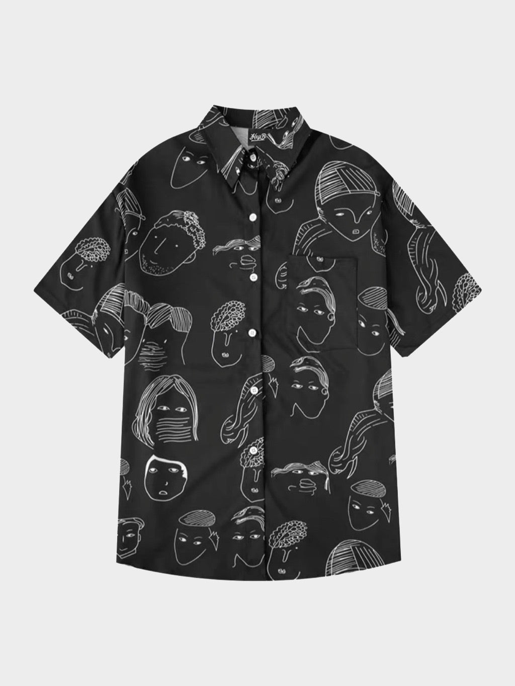 black shirt with white sketches faces