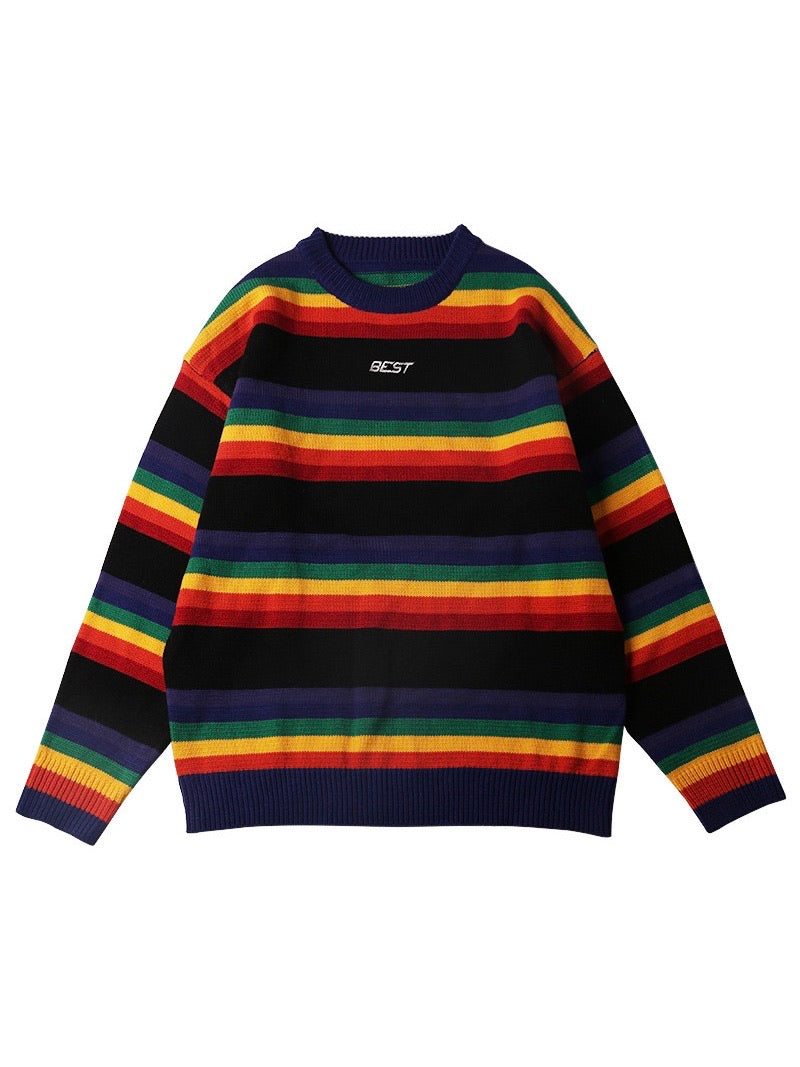 knitted sweater with rainbow lines between big black lines. Best is embroidered in white on the chest on a black line