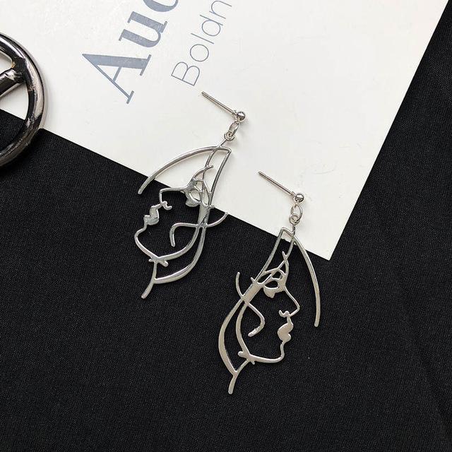 Silver Profile Face earrings