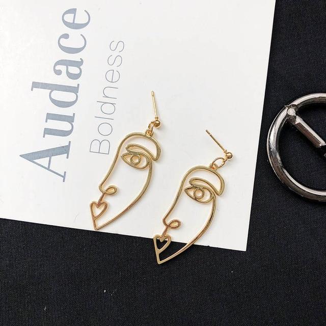 Gold Profile Face earrings