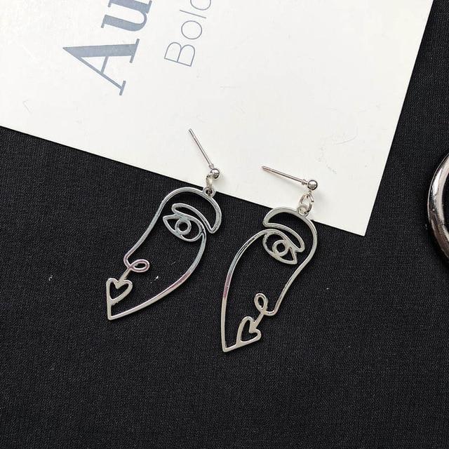 silver Profile Face earrings