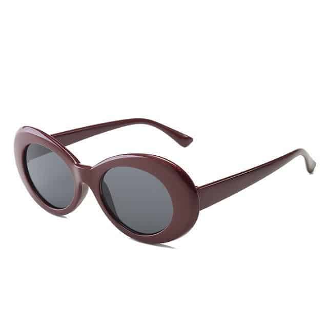 brown frame and purple and black glass sunglasses